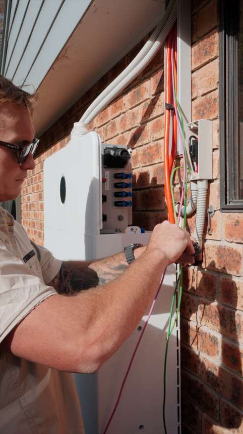 Elite Energy licensed electrician at work